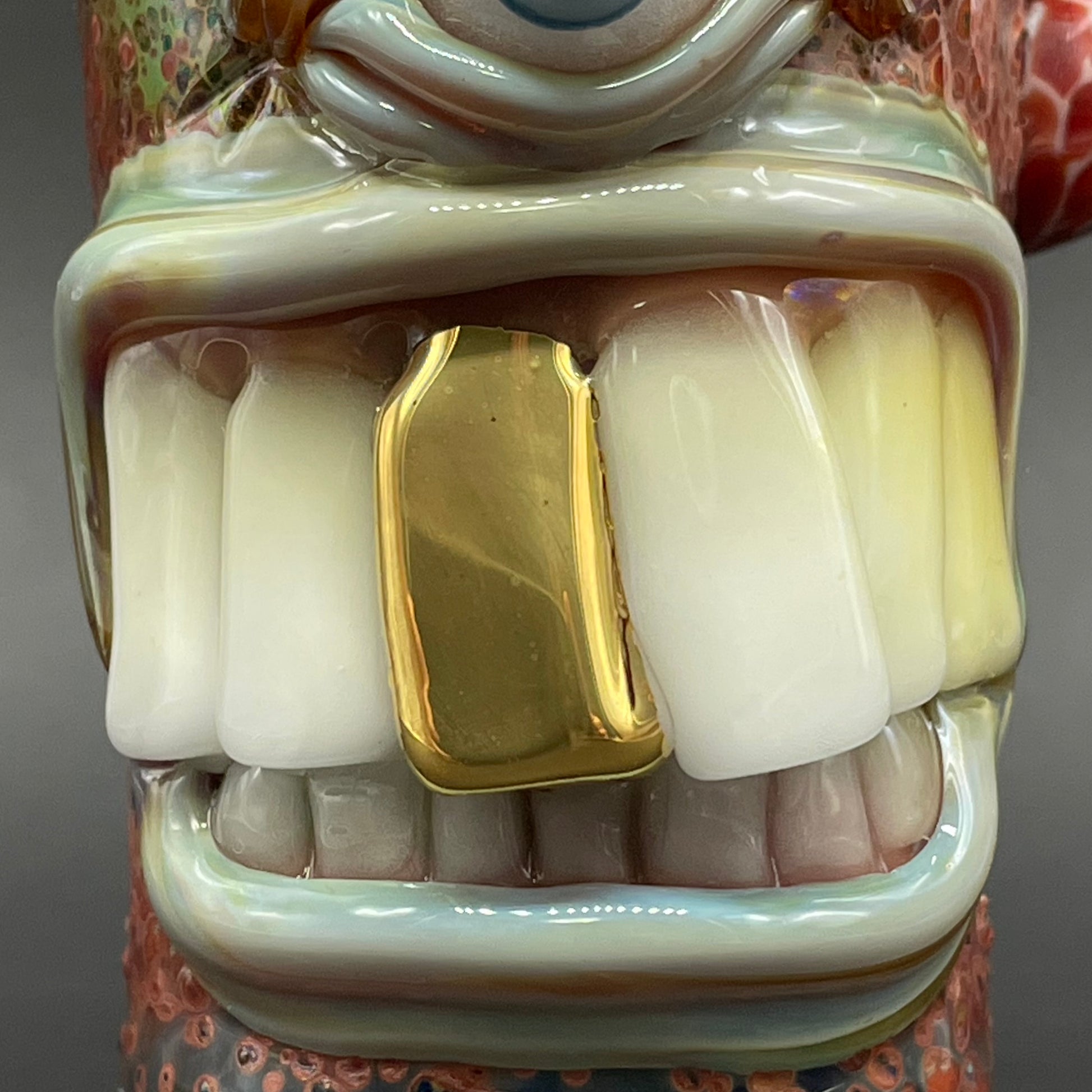 Close-up of Big tooth Cyclops shot glass - handcrafted glass