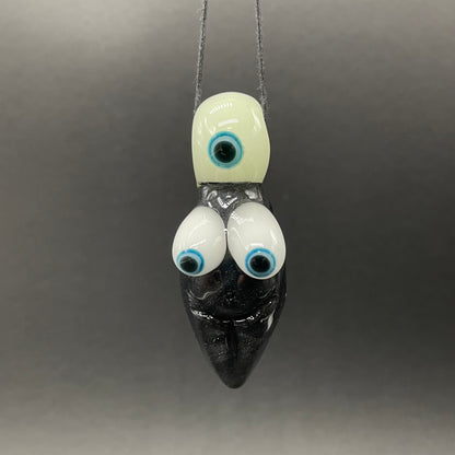 Hand-blown glass Black light reactive fertility pendant by Leviathan Glass