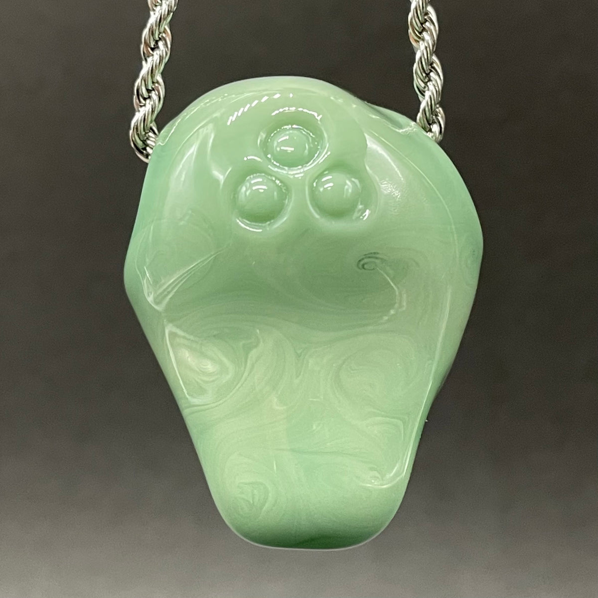 Time manipulating three eye glass alien pendant