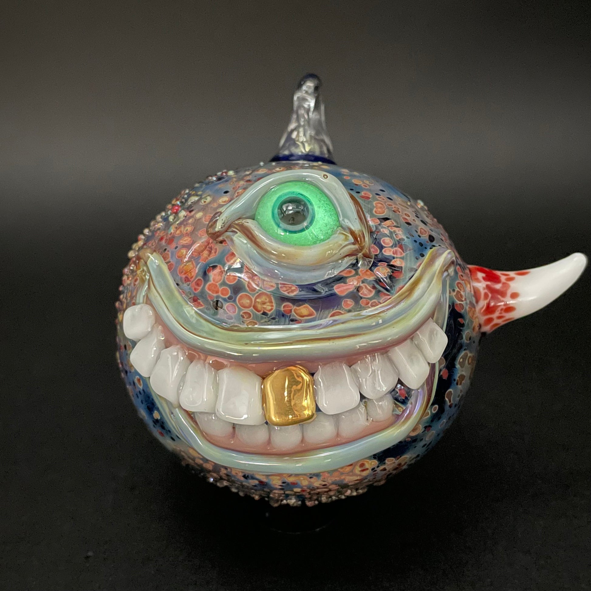 Artisan glass Smiling cyclops ornament - detailed craftsmanship