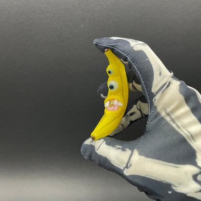 Grinning glass banana pendant