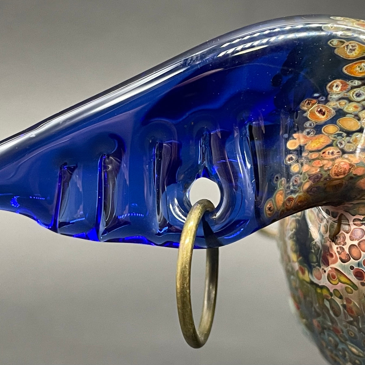 Close-up of Goblin glass ornament - handcrafted glass