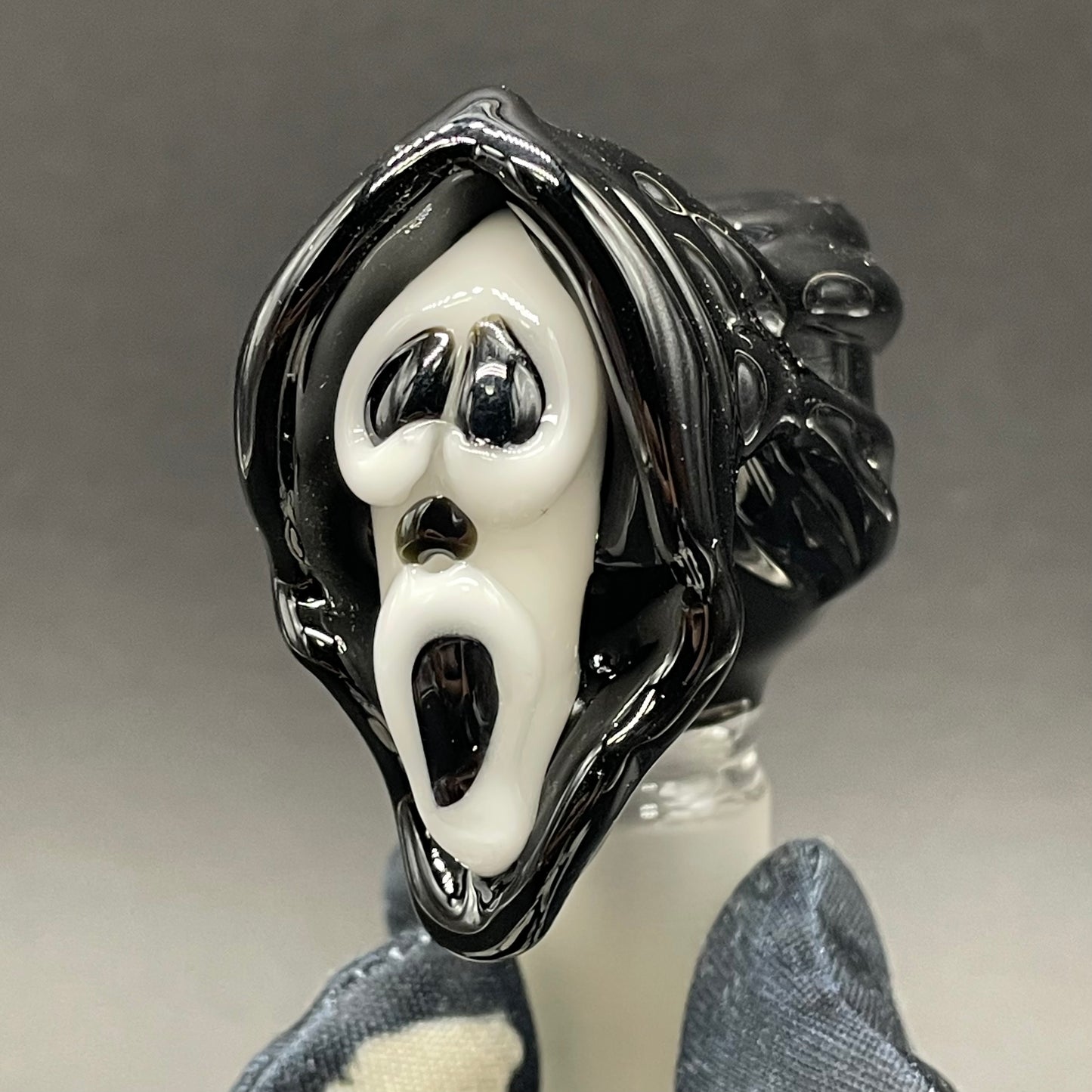 Close-up of 18mm scream slide - handcrafted glass