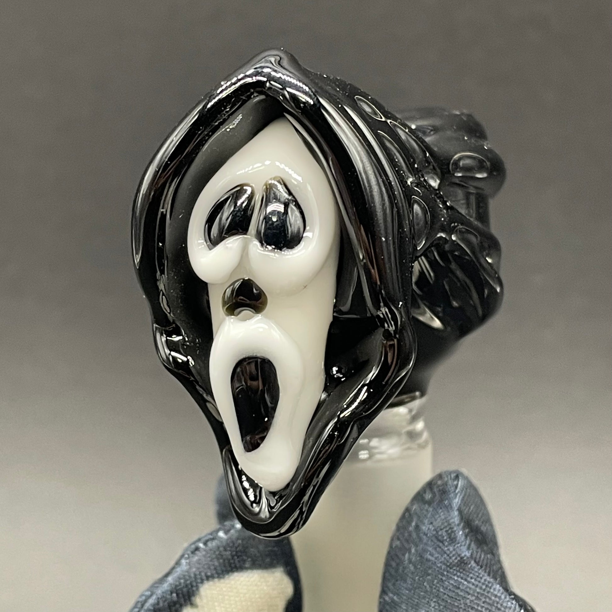 Close-up of 18mm scream slide - handcrafted glass
