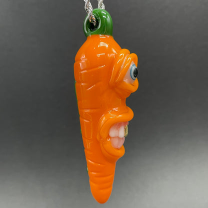 Close-up of Glass carrot pendant - handcrafted glass