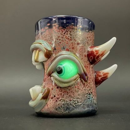 Close-up of Screaming shot glass - handcrafted glass