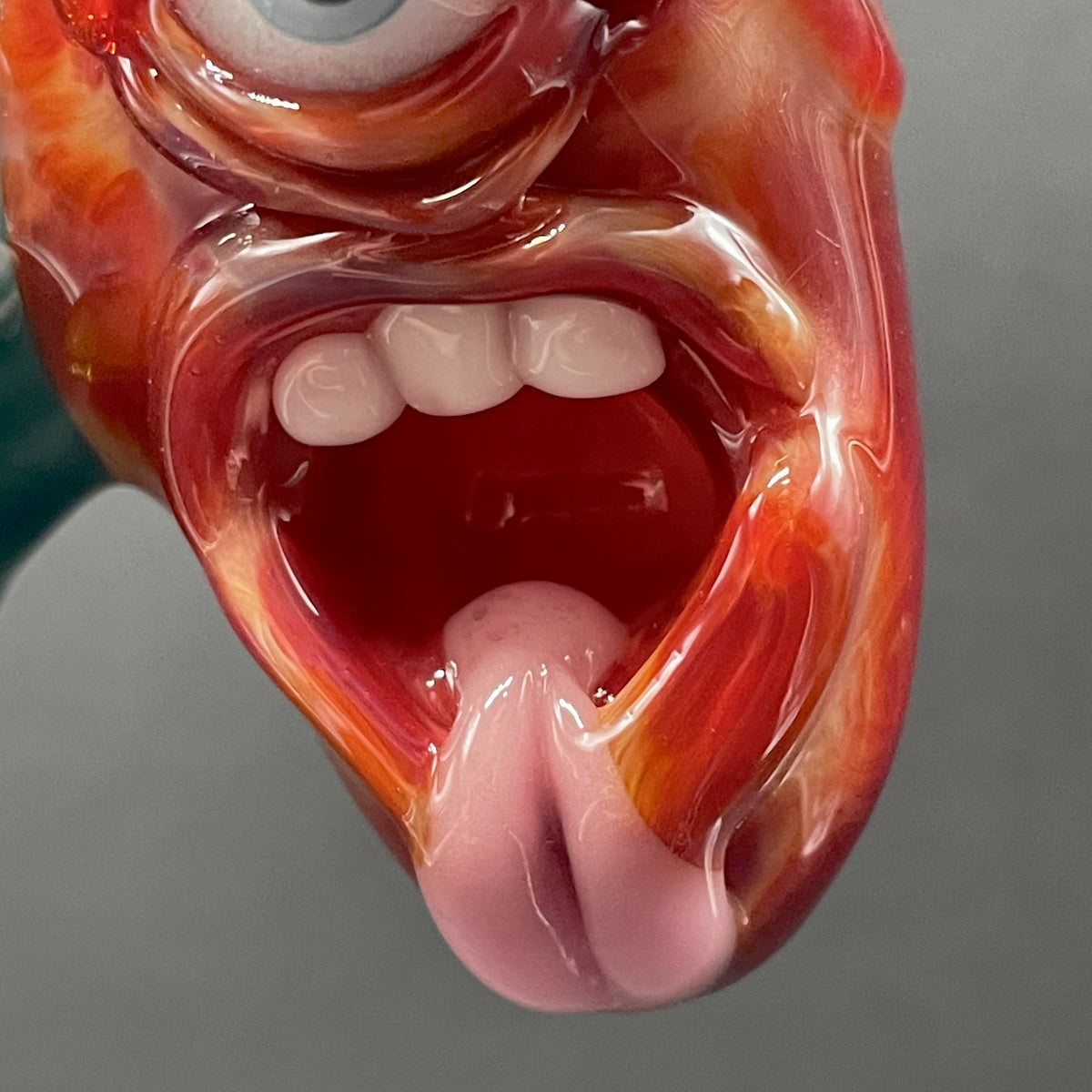 Two Headaches Are Better Than One handblown glass pendant - teal cyclops head with white teeth and green slime fused with red cyclops head with pink tongue, silver rope chain - Leviathan Glass