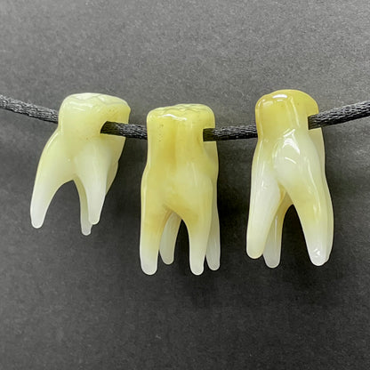 3 glass tooth beads craftsmanship - artisan glass work