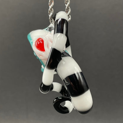 Beetlejuice Inspired handblown solid glass Sandworm sculpture - coiled black and white striped sandworm with white worm head, teal tongue, red eyes - Leviathan Glass