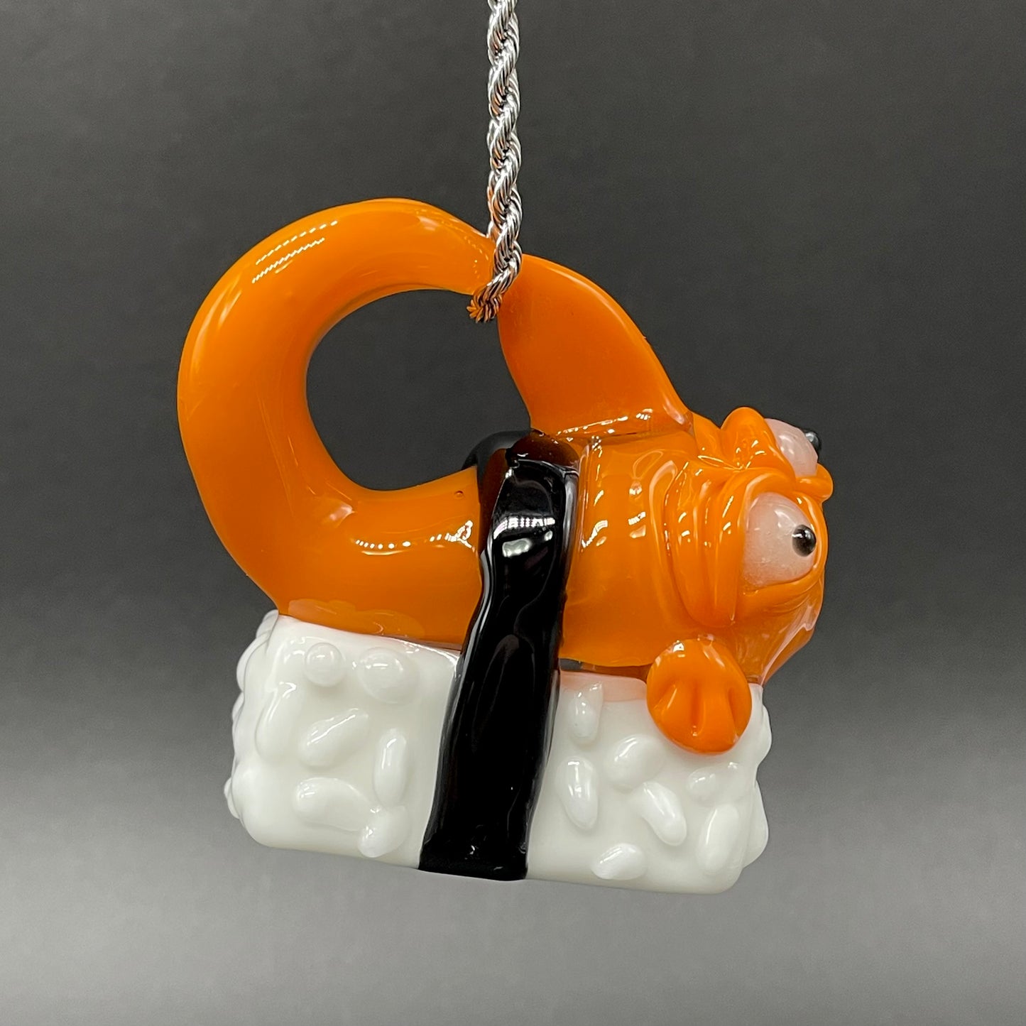 Mutant three eyed fish sushi glass pendant