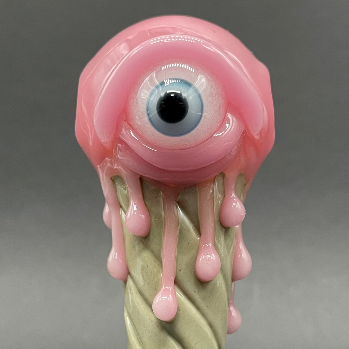 Close-up of Eye scream cone pendant - handcrafted glass