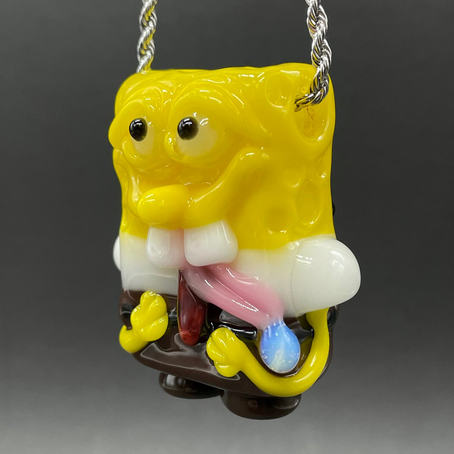 Close-up of Sponge bob square pants glass pendant - handcrafted glass