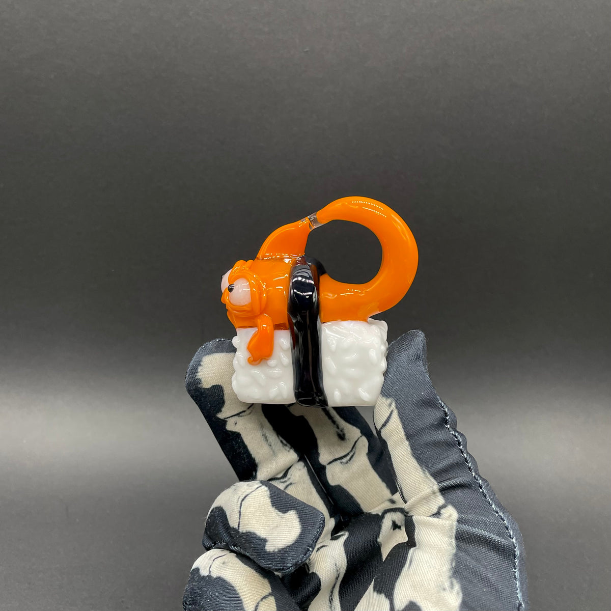 Mutant three eyed fish sushi glass pendant