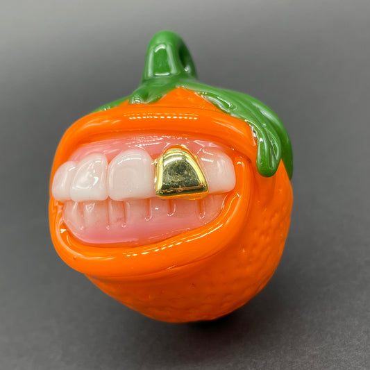 Toothy orange pendant detail view - premium glass art