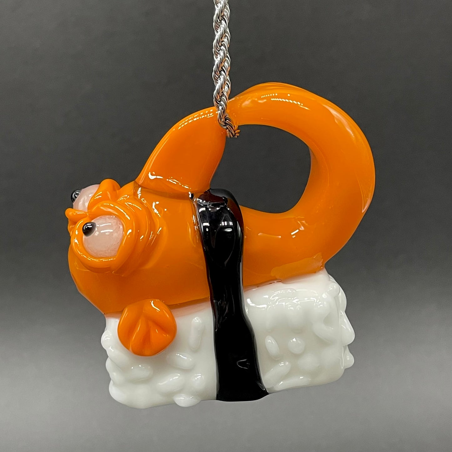 Mutant three eyed fish sushi glass pendant