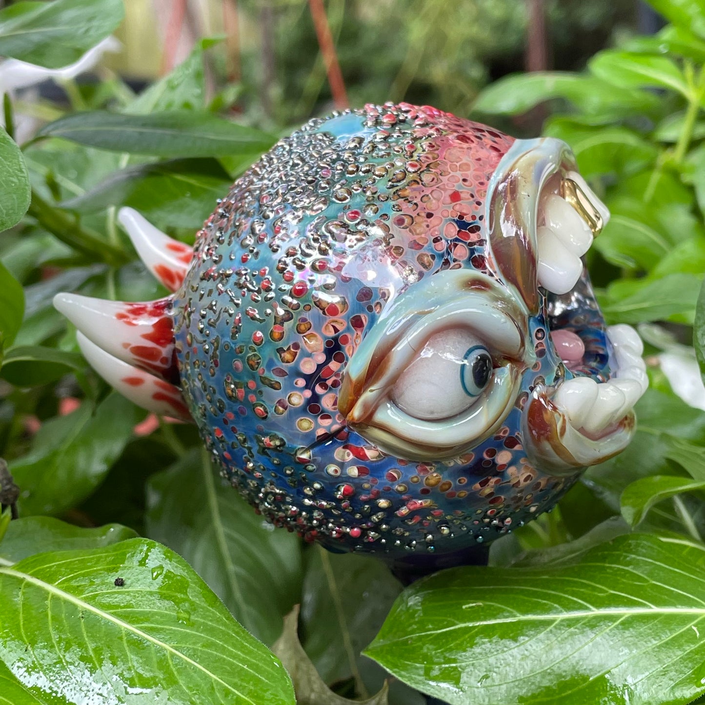 Hand blown glass monster watering globe