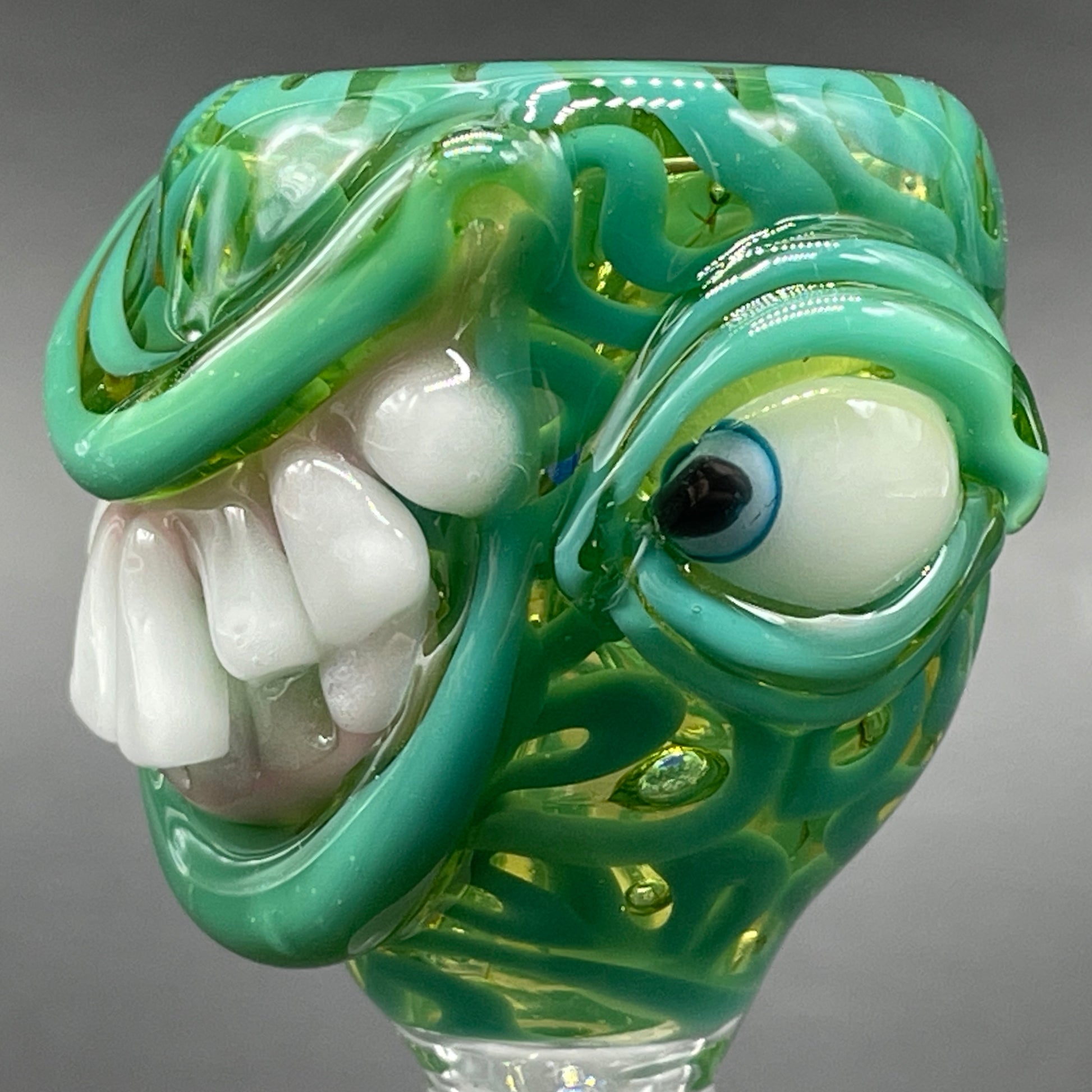 Hand-blown 14mm uv smiley face slide - Leviathan Glass original