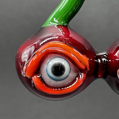 Cherry flavored glass eye pendant