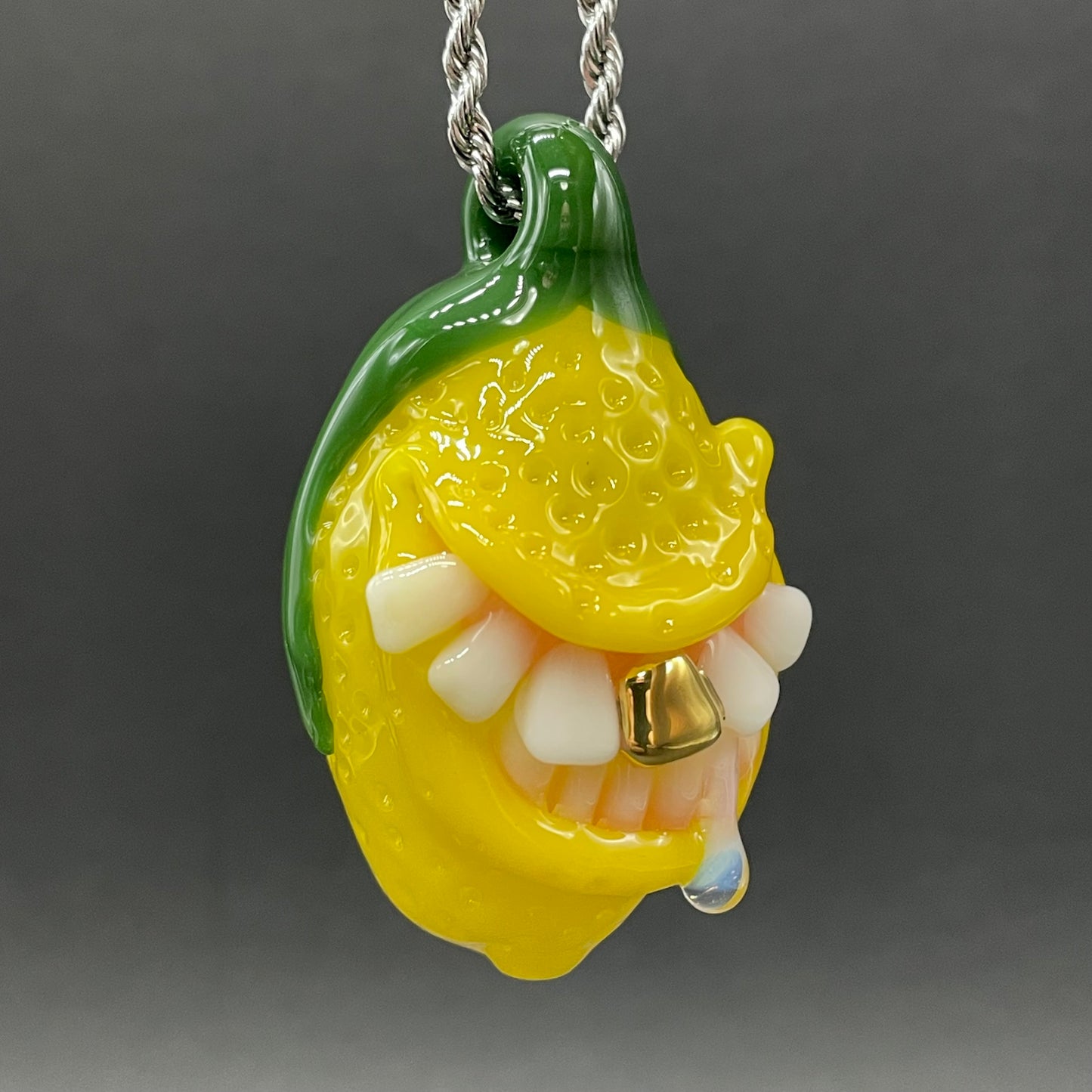 Grinning lemon pendant
