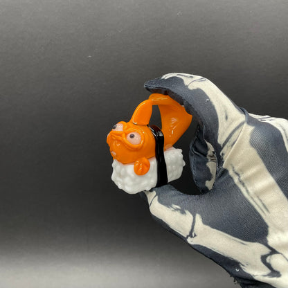 Mutant three eyed fish sushi glass pendant