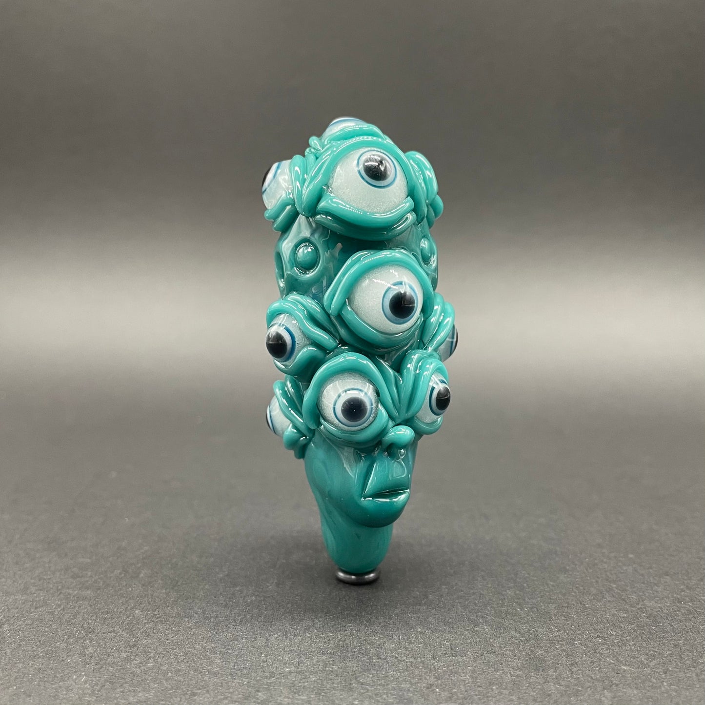 Hand-blown glass The Never-Blinking One glass effigy pendant by Leviathan Glass