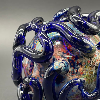 Artisan glass Worm Globe ornament - detailed craftsmanship
