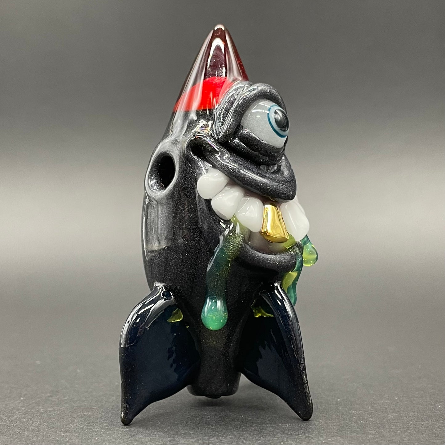 Close-up of The president of boom land - handcrafted glass