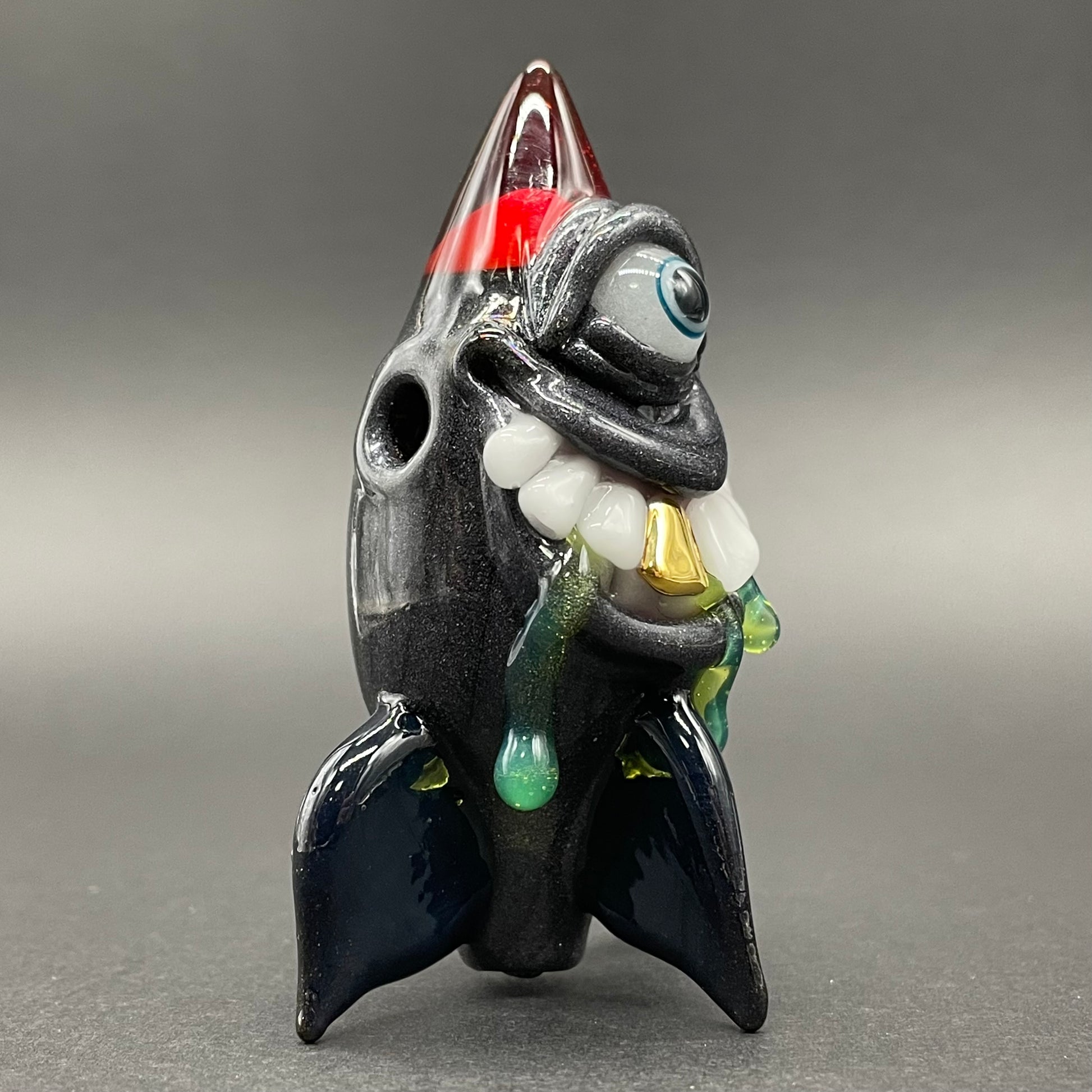 Close-up of The president of boom land - handcrafted glass
