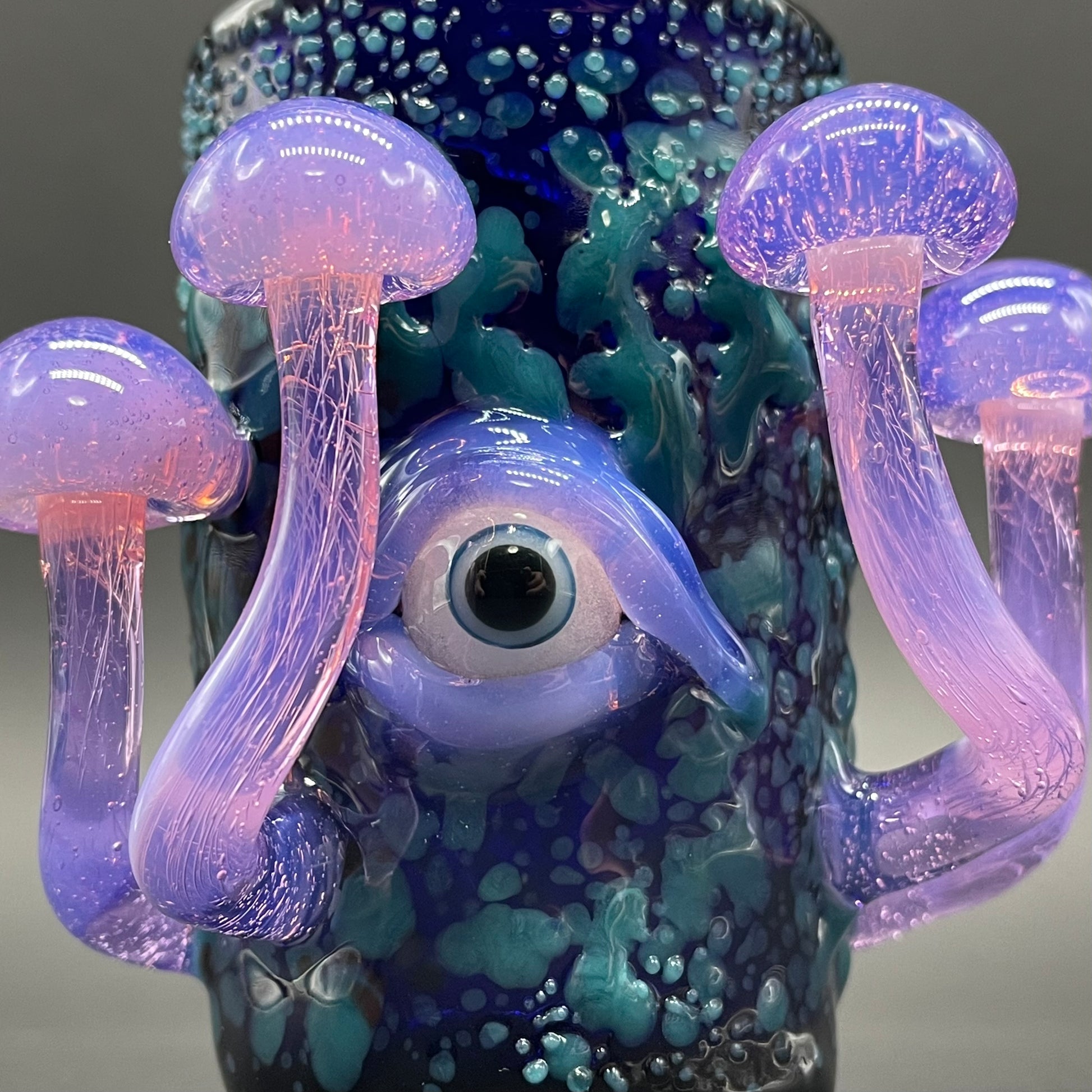 Close-up of Pink Slime Mushroom Shot Glass - handcrafted glass