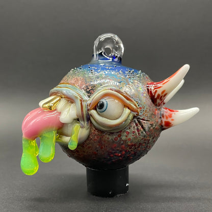 Close-up of Tongue demon ornament - handcrafted glass
