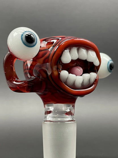 Close-up of 18mm Drain Bamage slide - handcrafted glass