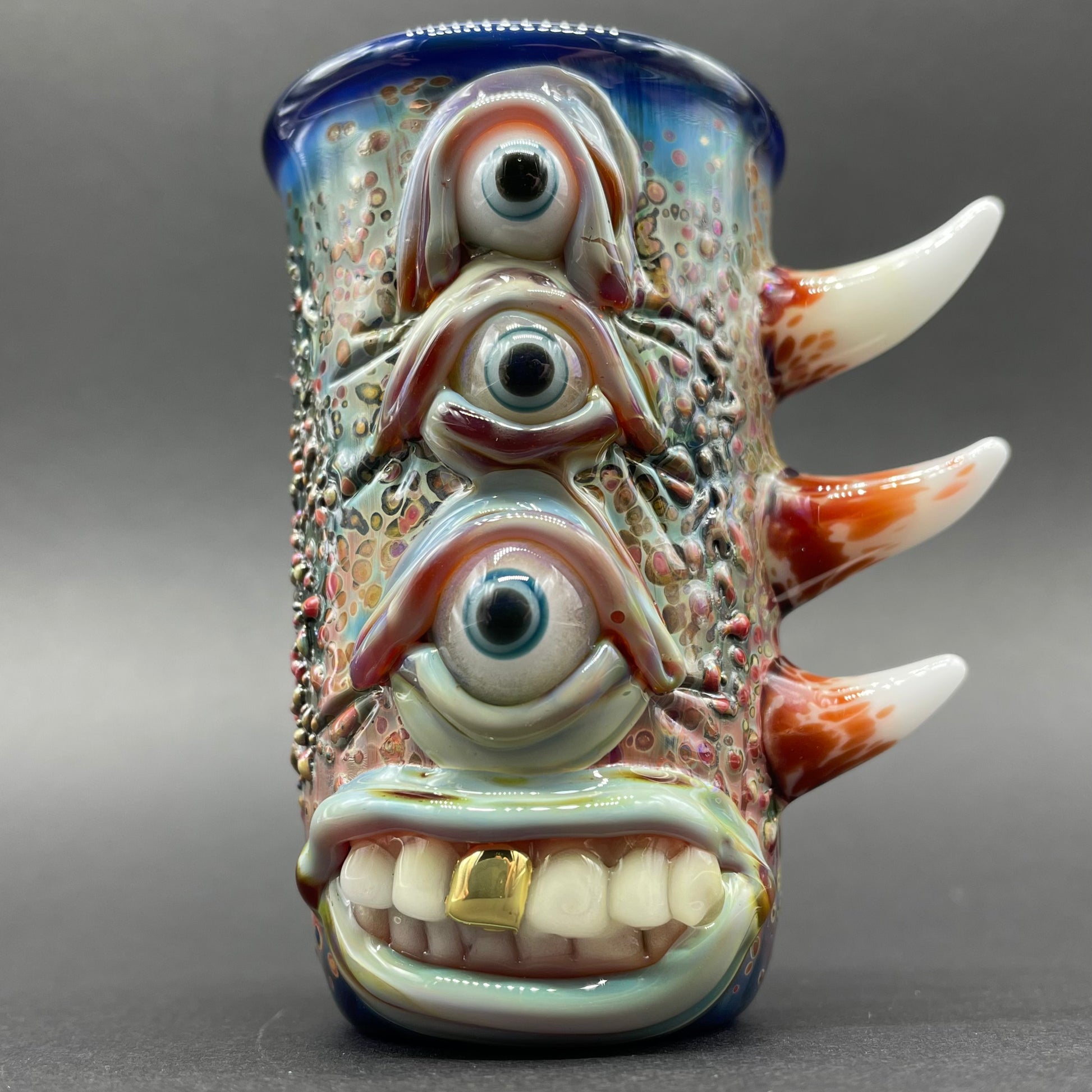Vertical 3 eye shot glass detail view - premium glass art