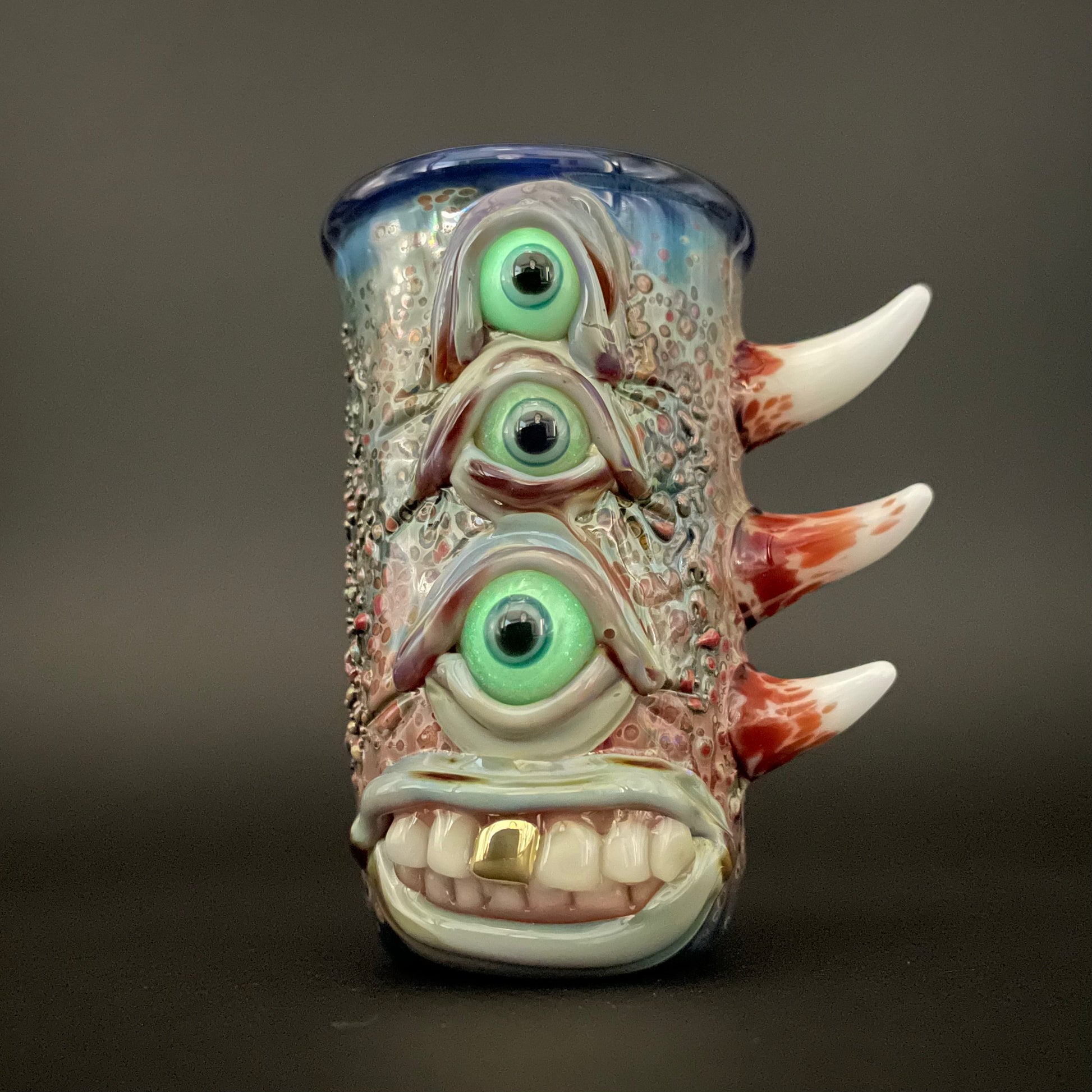 Vertical 3 eye shot glass by Leviathan Glass - artisan detail