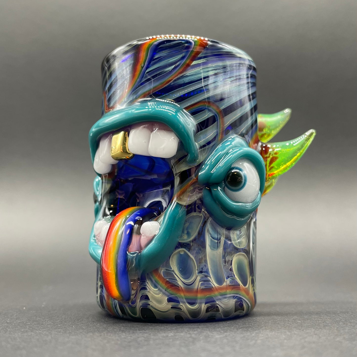 Screaming rainbow tongue shot glass detail view - premium glass art