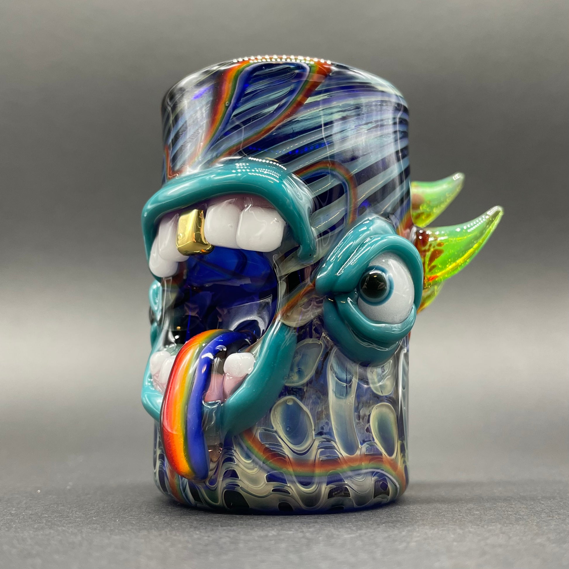 Screaming rainbow tongue shot glass detail view - premium glass art