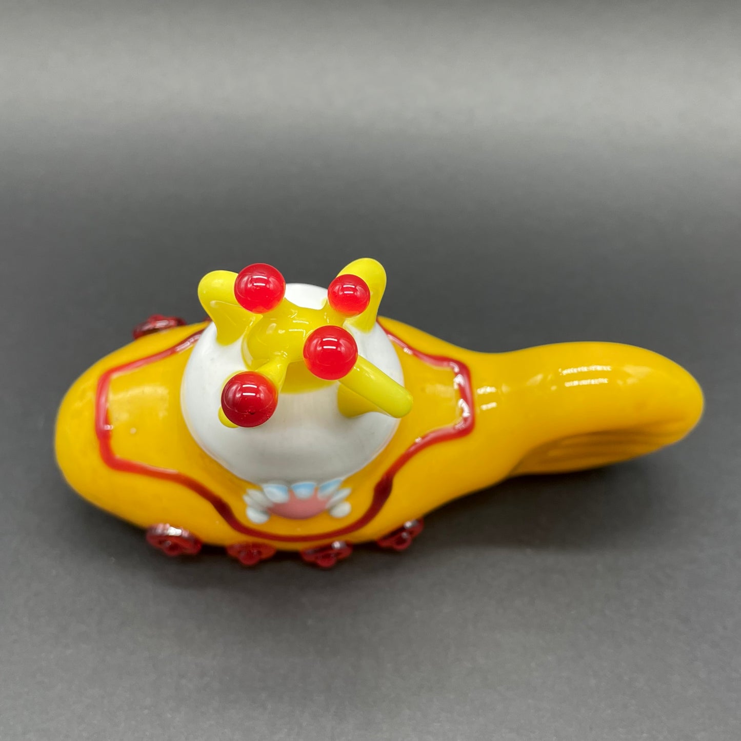 glass yellow submarine ornament by Leviathan Glass - artisan detail