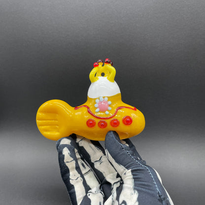 Close-up of glass yellow submarine ornament - handcrafted glass