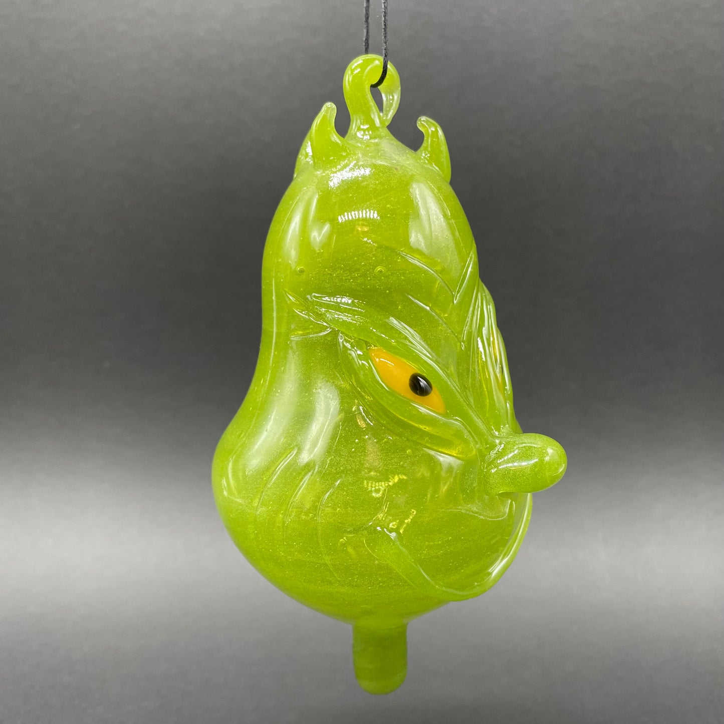 Close-up of The Grinch - handcrafted glass