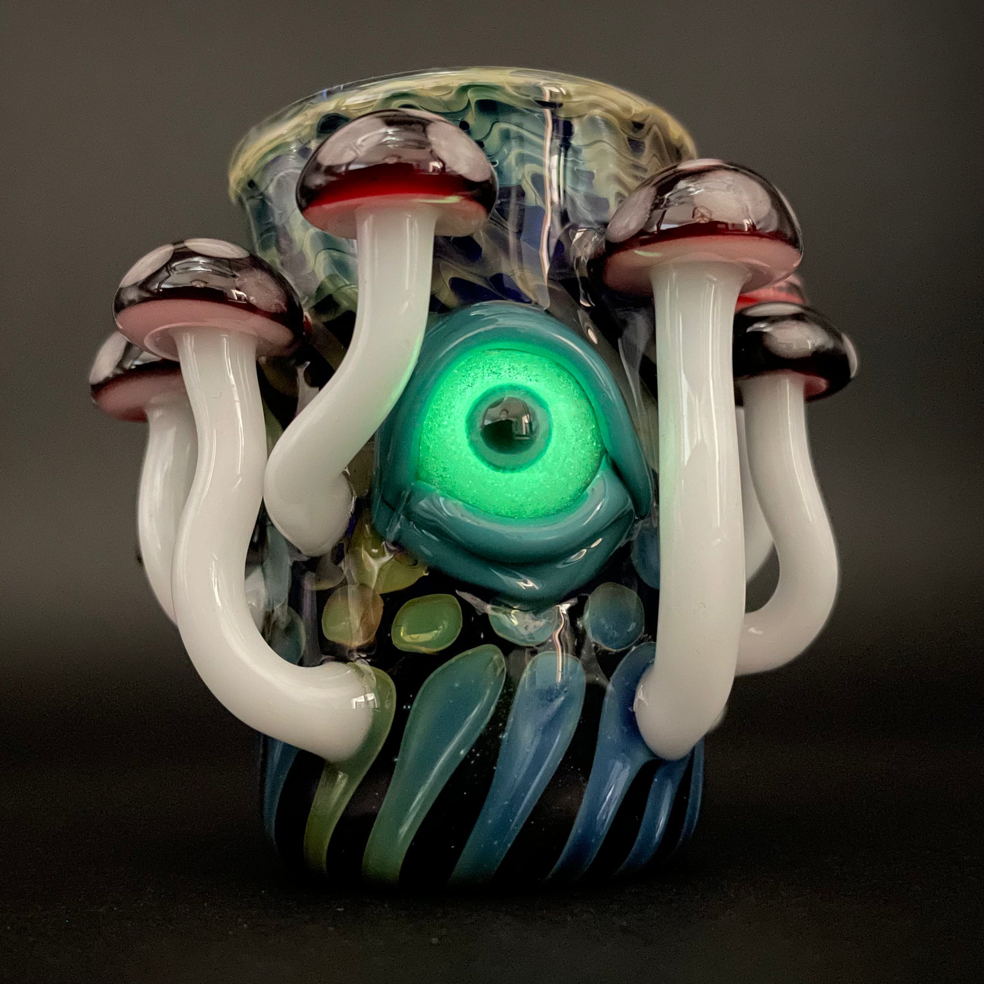 Red mushroom shot glass detail view - premium glass art
