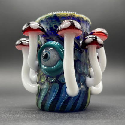 Close-up of Red mushroom shot glass - handcrafted glass