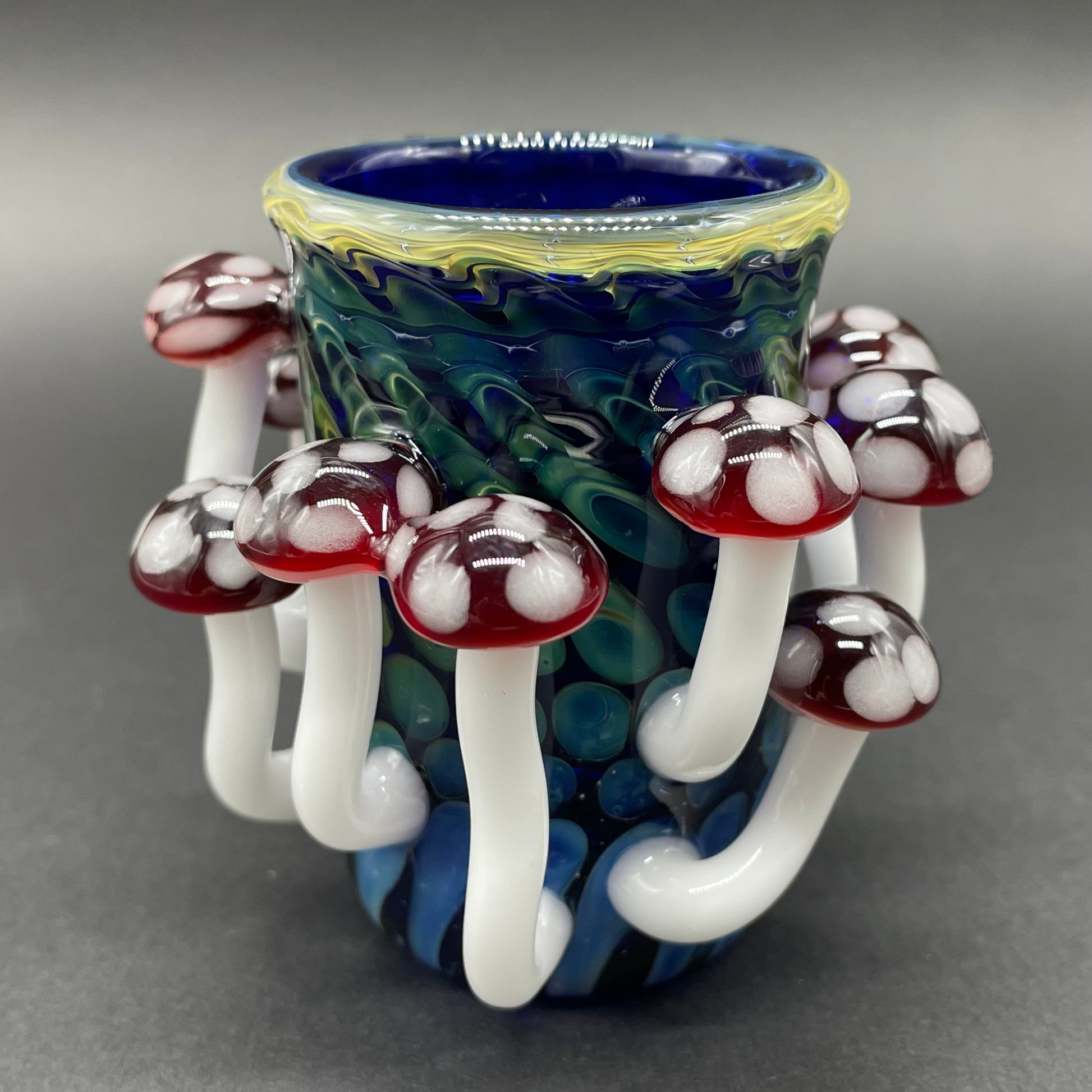 Red mushroom shot glass by Leviathan Glass - artisan detail