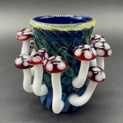 Red mushroom shot glass by Leviathan Glass - artisan detail