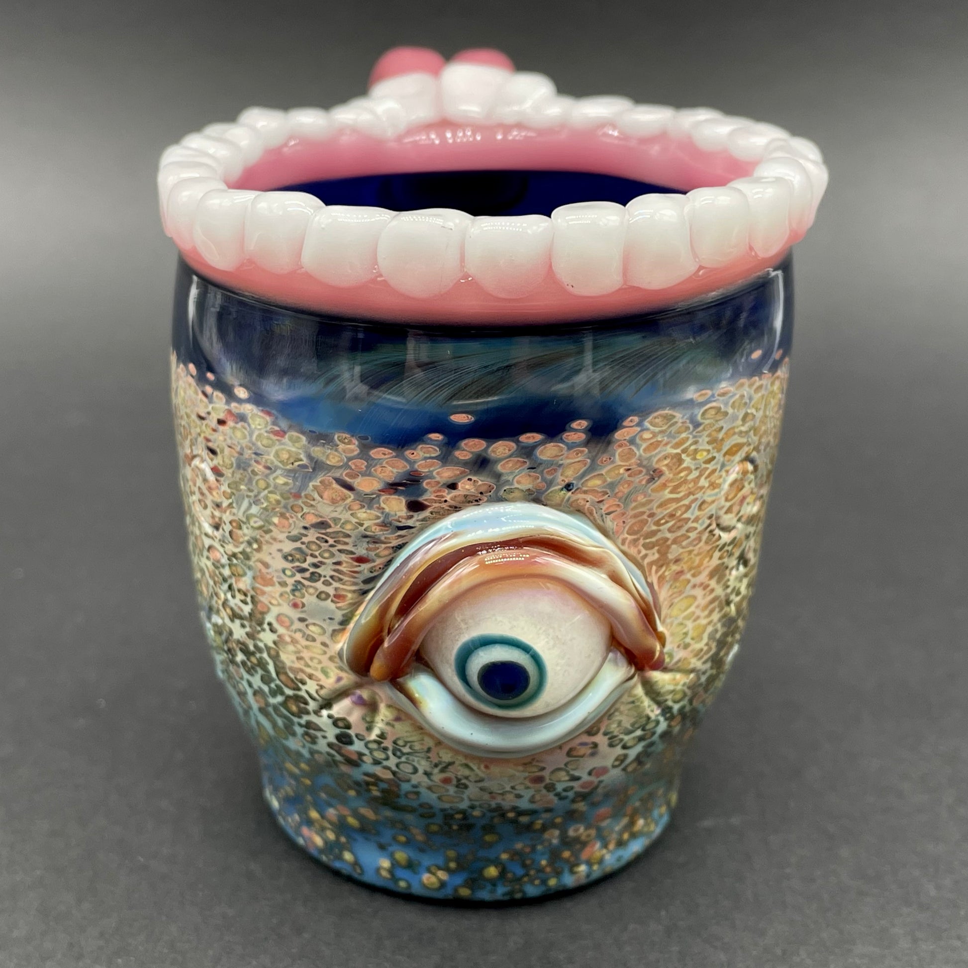 Close-up of Hangry tea cup - handcrafted glass