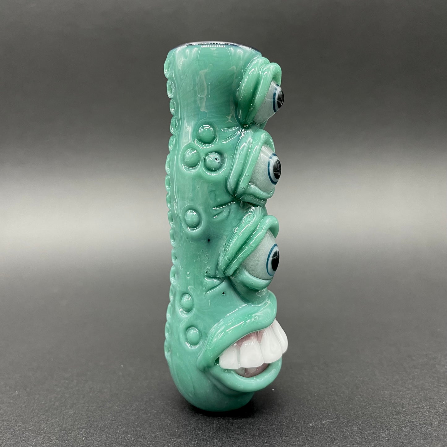 Close-up of Triclops Chillum - handcrafted glass