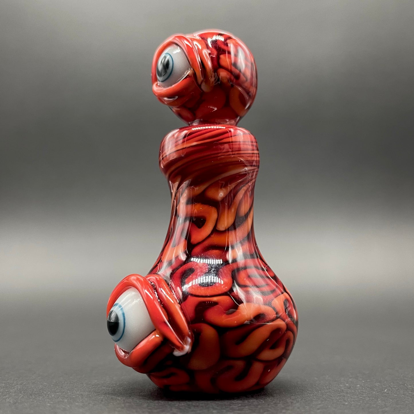 Close-up of Small Brain potion bottle - handcrafted glass