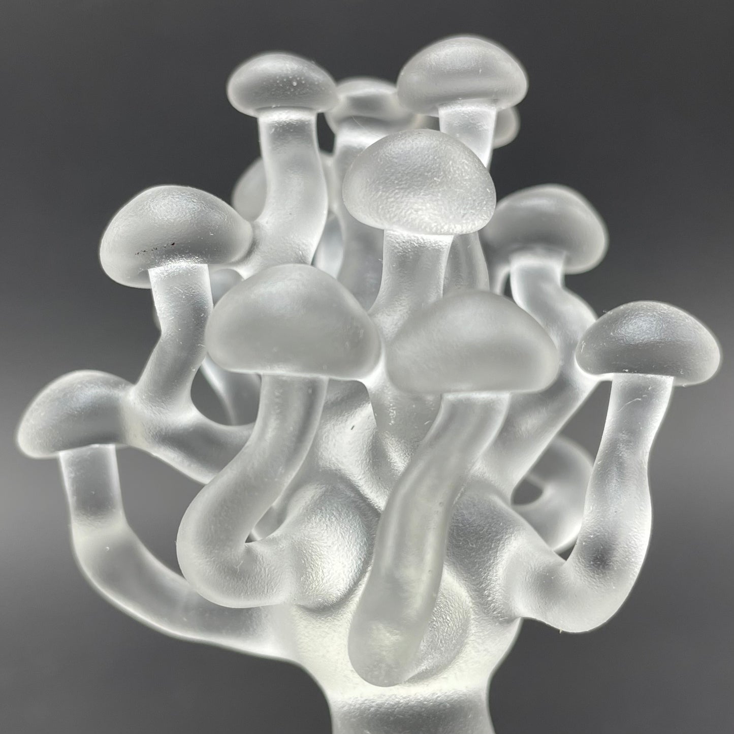 Close-up of small glass mushroom sculpture - handcrafted glass
