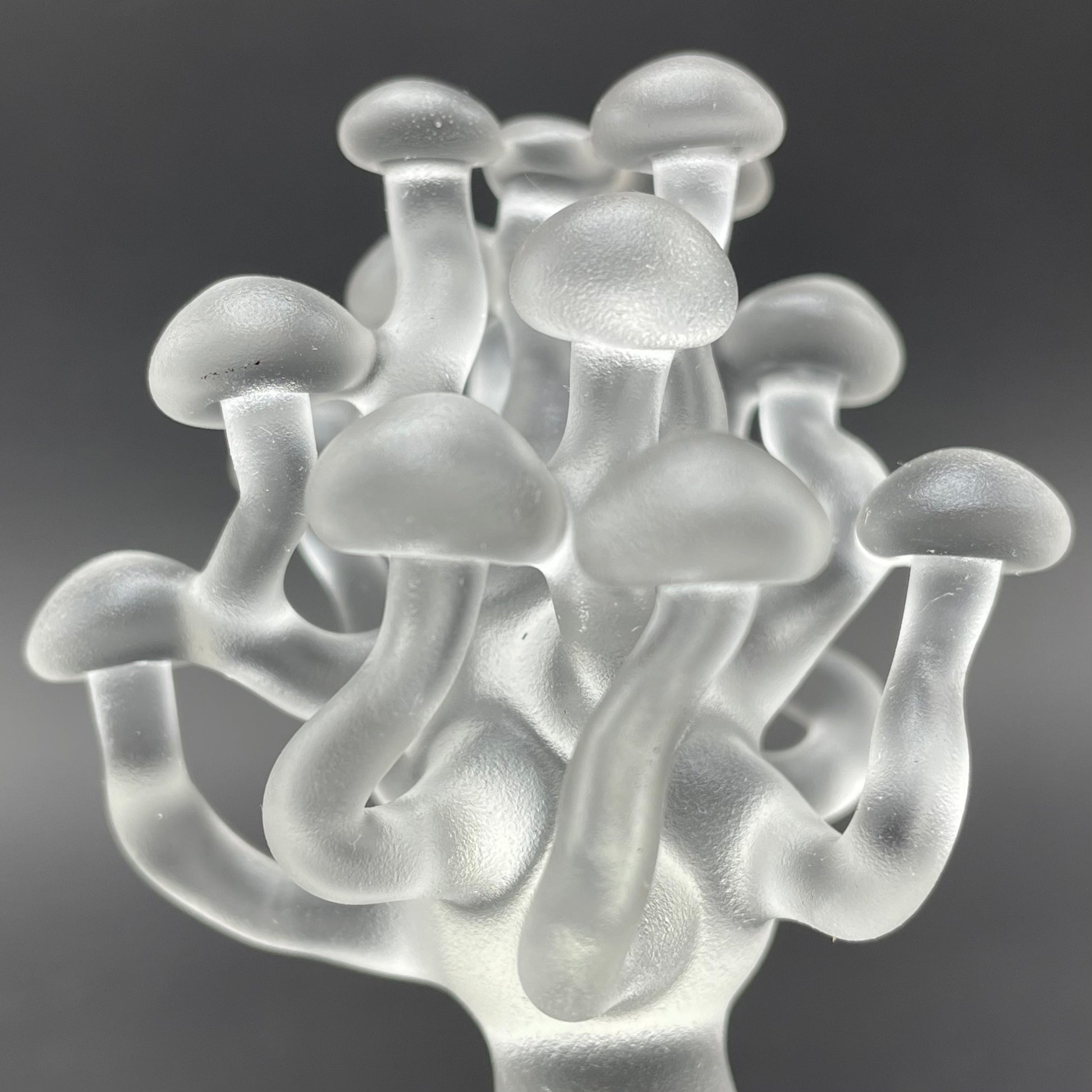 Close-up of small glass mushroom sculpture - handcrafted glass