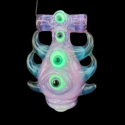 Pink slime evil eye pendant by Leviathan Glass - artisan detail