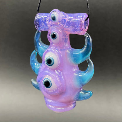 Pink slime evil eye pendant detail view - premium glass art