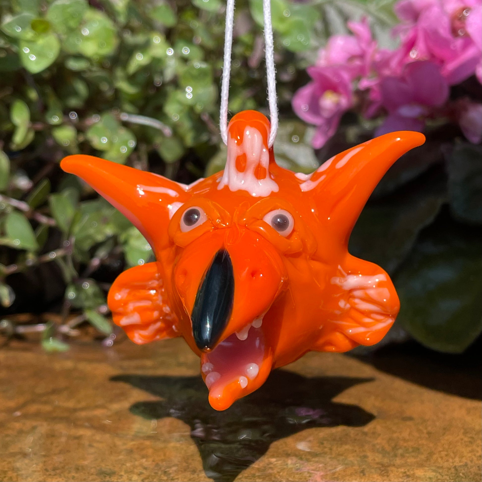 Glass Fireys pendant detail view - premium glass art